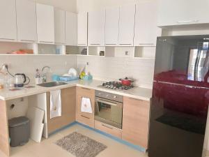 Kuchyň nebo kuchyňský kout v ubytování Apartment Marassi