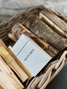 a basket of bread with a tag on it at Bimble cottage. The Cosy Snowdonia Hideaway in Llanuwchllyn