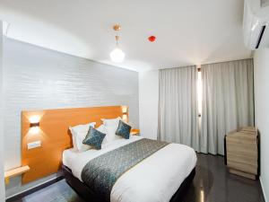 Postel nebo postele na pokoji v ubytování Hotel SunSet Beni Mellal