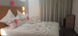 Postel nebo postele na pokoji v ubytování Hotel SunSet Beni Mellal