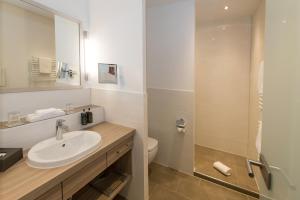 Koupelna v ubytování Hotel Oranien Wiesbaden