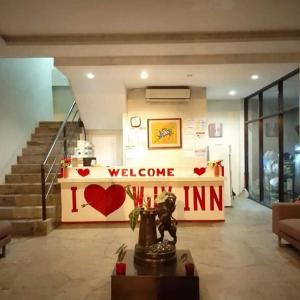 a lobby with a welcome sign in a building at WJV INN CASUNTINGAN in Mandaue City