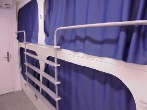 Posteľ alebo postele v izbe v ubytovaní Dream Cube Hostel