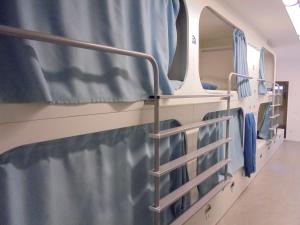 Un ou plusieurs lits superposés dans un hébergement de l'établissement Dream Cube Hostel