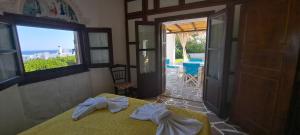 Postel nebo postele na pokoji v ubytování Villa Mantalena + 37 fotografií