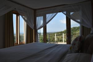 Postel nebo postele na pokoji v ubytování Villa Reva Bali + 37 fotografií