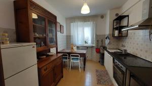 Кухня или мини-кухня в Appartamento Da Castlin
