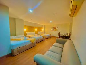 Postel nebo postele na pokoji v ubytování Tagaytay Hotel SixB + 26 fotografií