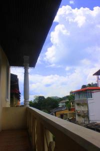 a view from the balcony of a building at Spice & Herb Rooms & Food in Kandy