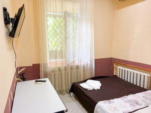 Postel nebo postele na pokoji v ubytování Mini-hotel in the heart of Kiev