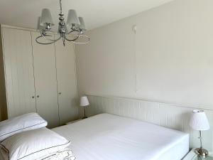 Voodi või voodid majutusasutuse Residentie Rapallo Oostende with fantastic Sea View! toas