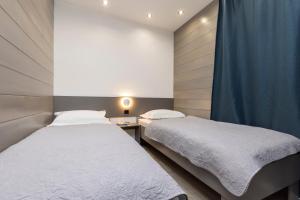 Living Point Mobile Homes客房内的一张或多张床位