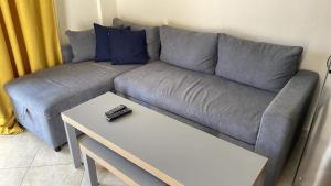 Posezení v ubytování The Olive Garden Apartment