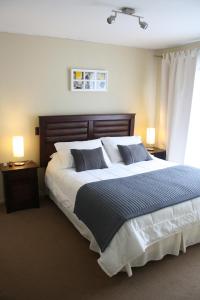 Postel nebo postele na pokoji v ubytování Hostal Buró