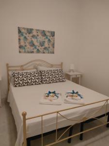 A bed or beds in a room at Casa Gioia