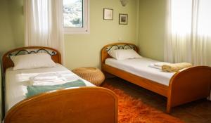 Posteľ alebo postele v izbe v ubytovaní family house in Nafplio