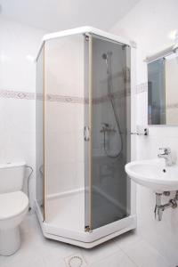 Koupelna v ubytování Hotel Pernigele