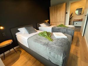 Posteľ alebo postele v izbe v ubytovaní Apartament Cobena