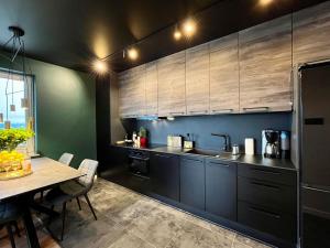 Kuchyňa alebo kuchynka v ubytovaní Apartament Cobena