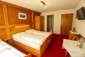 Postel nebo postele na pokoji v ubytování Haus Josef