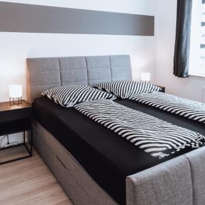 Postel nebo postele na pokoji v ubytování Ferienwohnung Goitzschezeit