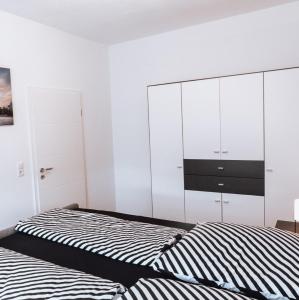 Postel nebo postele na pokoji v ubytování Ferienwohnung Goitzschezeit