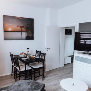 Kuchyň nebo kuchyňský kout v ubytování Ferienwohnung Goitzschezeit