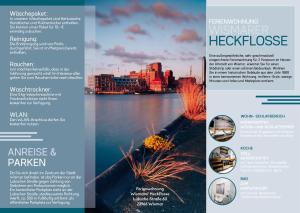 een flyer voor een hospice met uitzicht op een stad bij Wismarer Heckflosse in Wismar