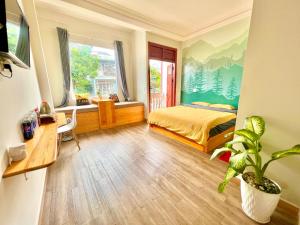 TV a/nebo společenská místnost v ubytování Nấm Home