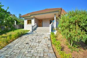 Vonkajšia záhrada v ubytovaní Casa con jardín próxima a Vilagarcía de Arousa