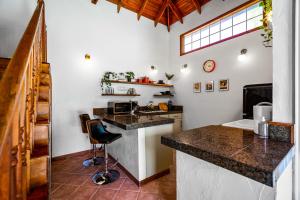 a kitchen with a sink and a counter top at Dallas Oak Lawn Oasis w/ Private Pool, Hot Tub in Dallas