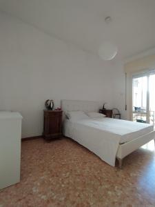 A bed or beds in a room at Brezza marina