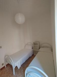 A bed or beds in a room at Brezza marina