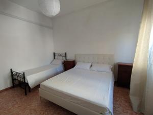 A bed or beds in a room at Brezza marina