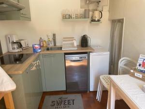 Kuchyňa alebo kuchynka v ubytovaní Magnifique appartement au cœur du centre ville