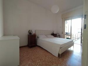 A bed or beds in a room at Brezza marina