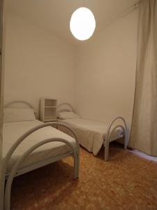 A bed or beds in a room at Brezza marina