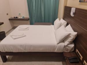 Postel nebo postele na pokoji v ubytování Minas Manor