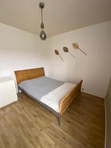 Katil atau katil-katil dalam bilik di Maison de ville avec terrasse