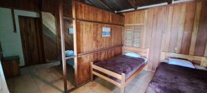 Postel nebo postele na pokoji v ubytování Pochotel