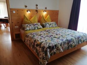 Łóżko lub łóżka w pokoju w obiekcie Appartement Seppi