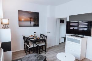 Kuchyň nebo kuchyňský kout v ubytování Ferienwohnung Goitzschezeit