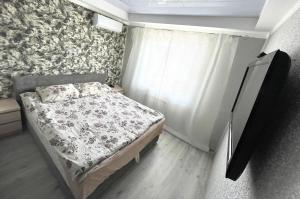 Posteľ alebo postele v izbe v ubytovaní Квартира напротив Дрим-Тауна