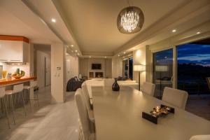 A seating area at Legrena Beach Villa