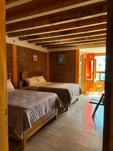Postel nebo postele na pokoji v ubytování Casa Diez-59 Guanajuato Capital