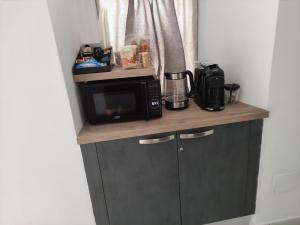 Kuchyň nebo kuchyňský kout v ubytování Rooms Vico Giunti