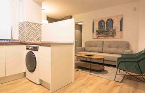 Kuchyňa alebo kuchynka v ubytovaní Apartamentos Leonor