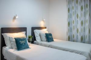 Posteľ alebo postele v izbe v ubytovaní Luxury apartment Casia with heated pool and pleasent terrace