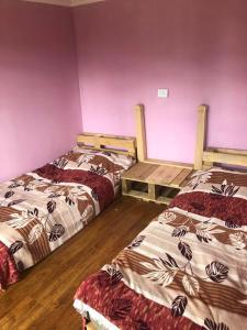 Postel nebo postele na pokoji v ubytování Guest House Gvidani