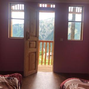 Postelja oz. postelje v sobi nastanitve Guest House Gvidani